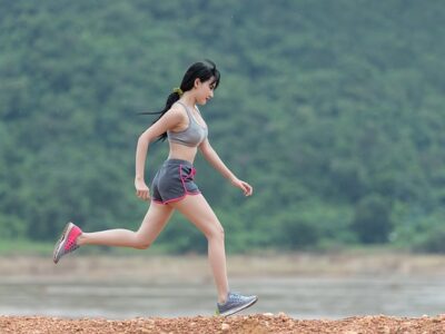 A woman jogging in the riverside