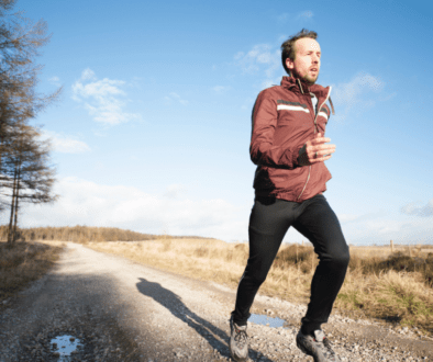 A man running during daytime enjoying the health benefits of probiotics