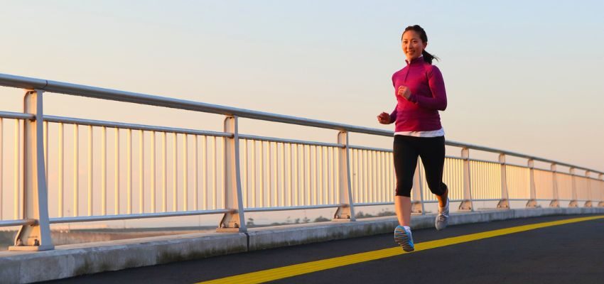 The woman eats hummus and exercises to lose weight.