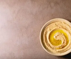 A bowl of hummus.