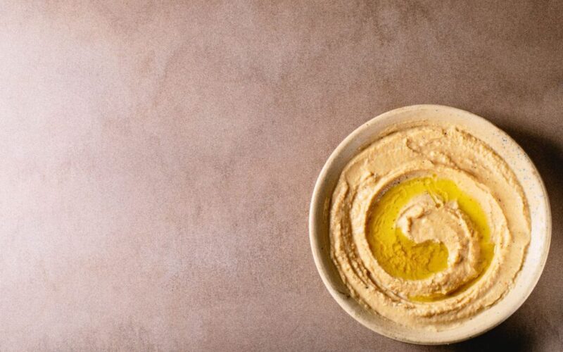 A bowl of hummus.