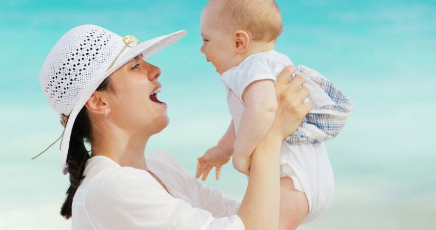 A mother is happy that her baby has no more constipation.