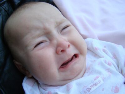 The baby is crying due to constipation