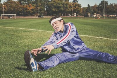 A woman stretching and doing regular physical exercise