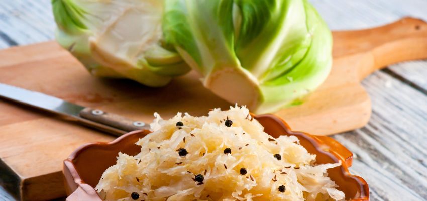 Bowl of sauerkraut highlighting health benefits sauerkraut provides for digestion