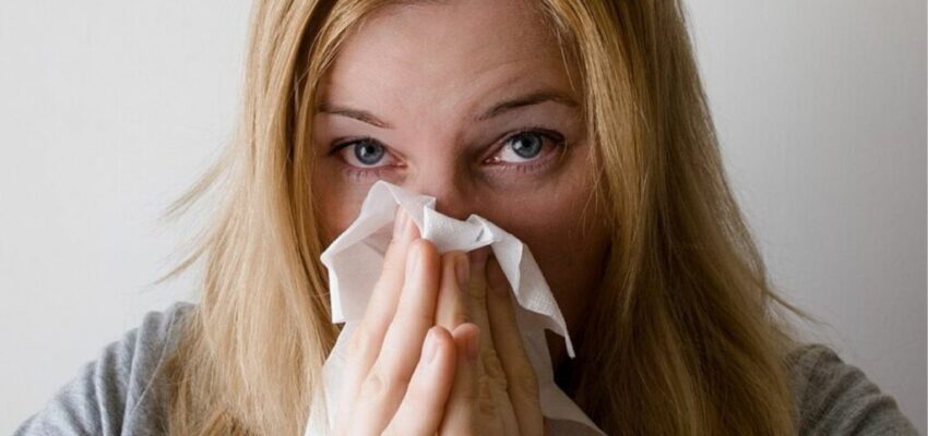 A woman suffering from sinus infection.