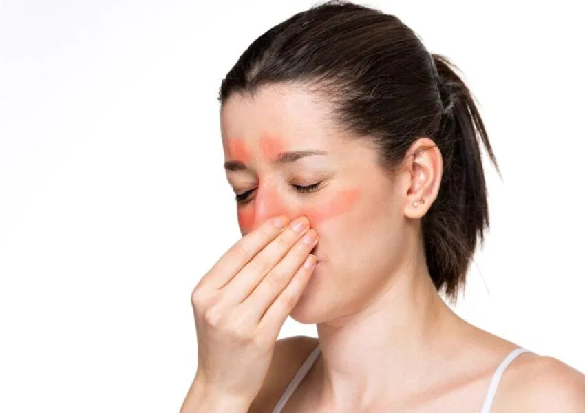 The woman suffers from a sinus infection.