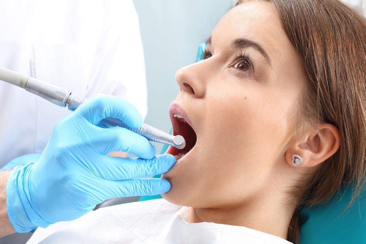 A picture of a patient in dental clinic during root canal session