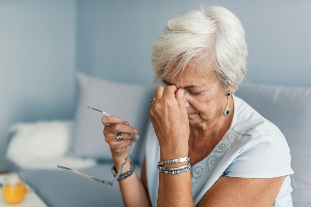 Old woman trying to treat her sinus infection that won't go away