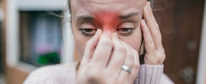 A woman smiling after her mouth sore was treated.