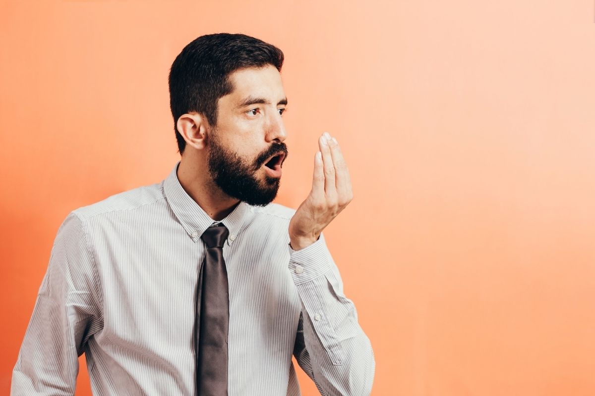 A man looking for the best probiotics for bad breath.