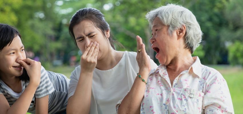 The grandmother has bad breath.