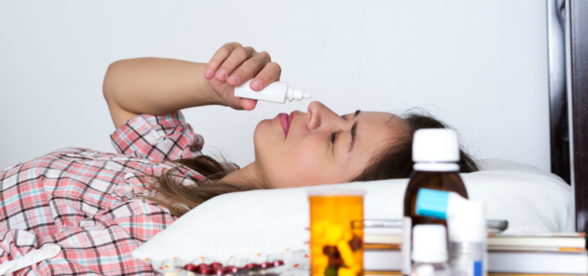 A woman smiling after her mouth sore was treated.