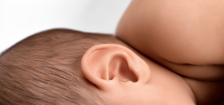 A baby was tugging at his ear due to earwax, and his mother put a few drops of warm mineral oil in the ear twice daily for five days as a home remedy.