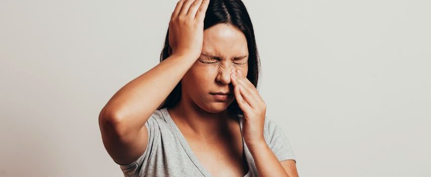 A woman eating sweet foods to get rid of salty taste in mouth.