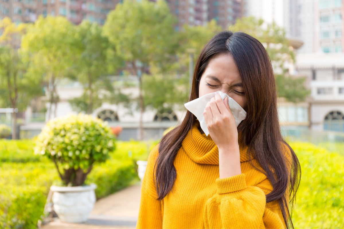 The woman suffers from an allergy that may cause tooth pain.