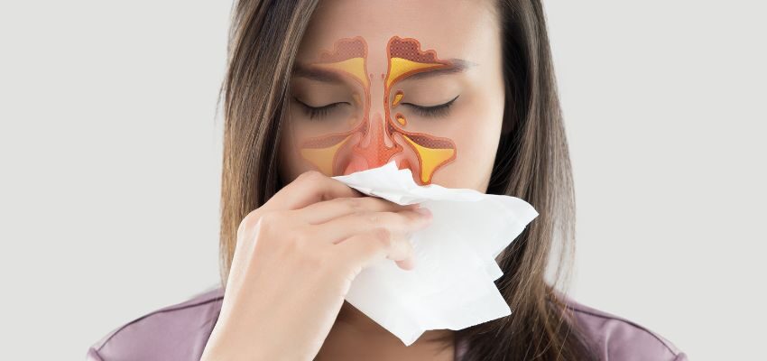link between sinus stomach problem (2) The woman has sinus problem.