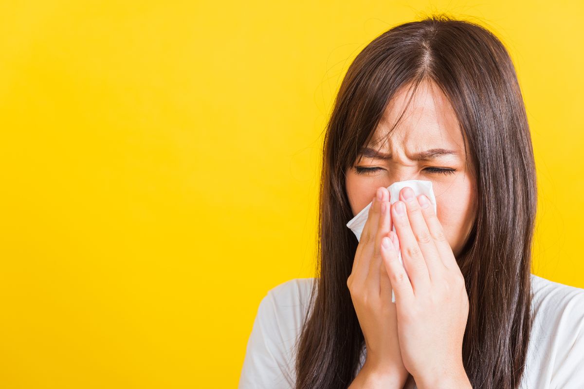 Woman experiencing crackling sound in sinuses