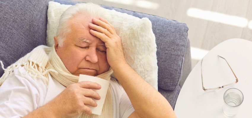 The older man is not feeling well due to post-nasal drip.