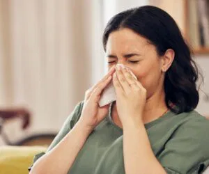 The woman has a sinus infection.