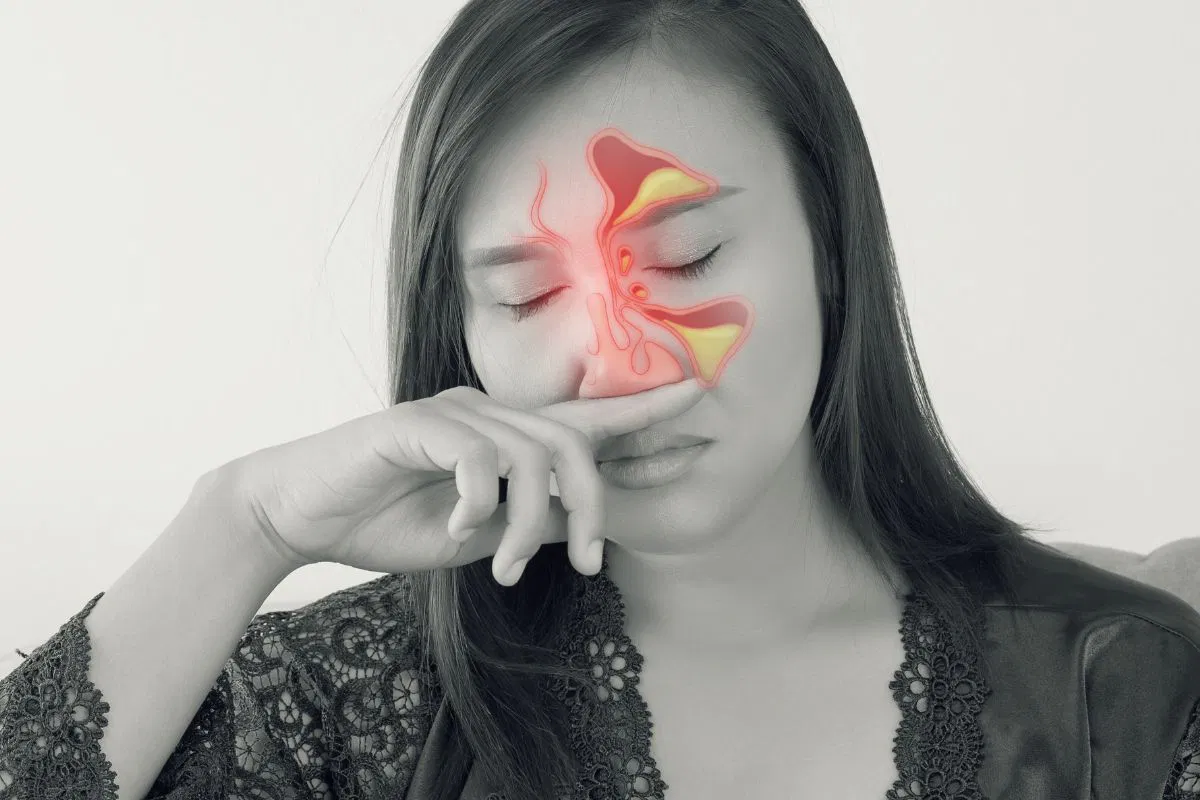 The woman has a sinus perforation.