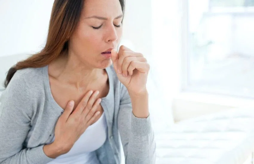 dehydration cause coughing (1) The woman is coughing.