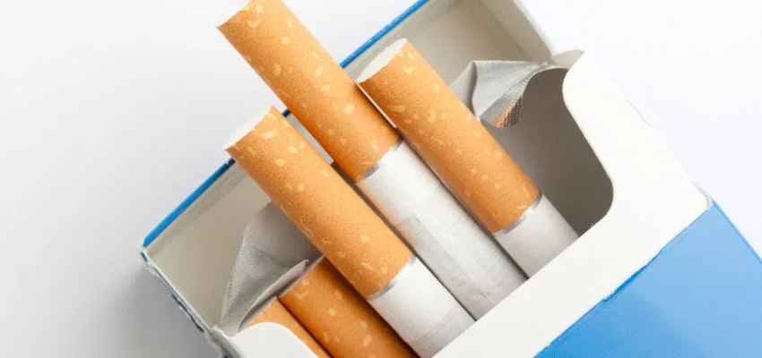 A pack of cigarettes may cause smoke breath.