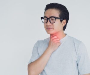 The man keeps getting a sore throat that comes and goes.