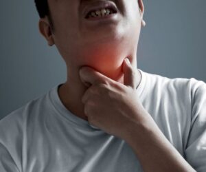 The man feels pain due to strep throat.