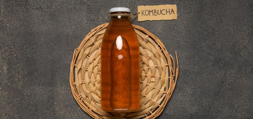 Leaving Kombucha out of the fridge for a while speeds up fermentation. This happens because of the warmer temperature.