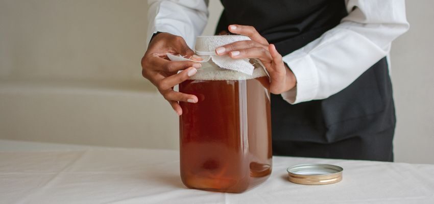 Preparing Kombucha starts by brewing sweetened black or green tea.