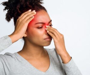 The woman suffers from a sinus infection.