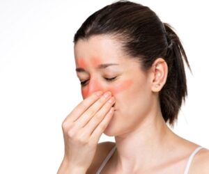 The woman suffers from sinus issues and needs a saline nasal rinse.