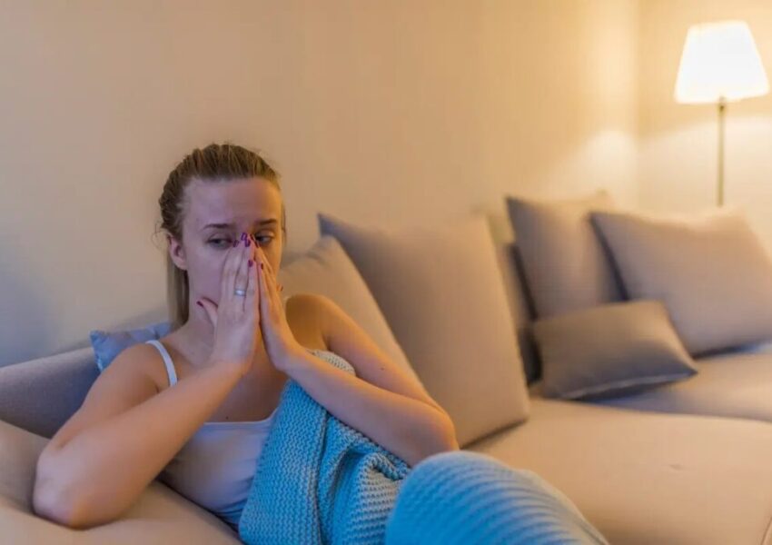 sinuss-massage A woman massages her sinuses to drain the maxillary sinus.