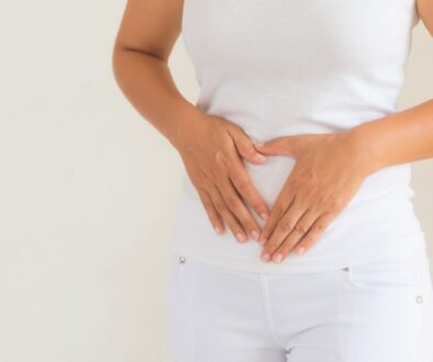 The woman has a healthy digestive system due to the presence of probiotics.