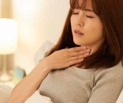 The woman's throat hurt when she woke up.