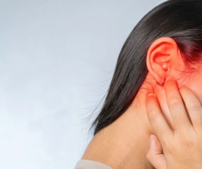 The woman has symptoms of Acute otitis media.