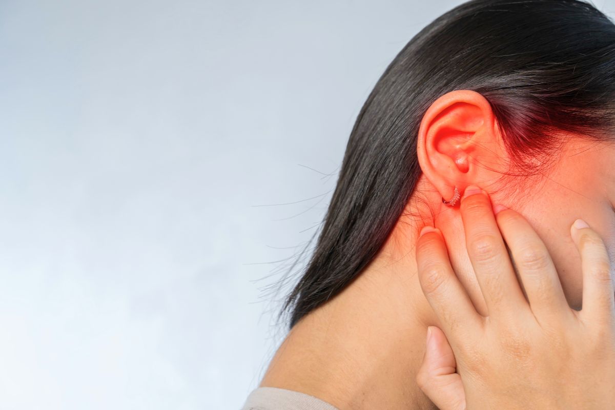A woman\'s smile showing good oral health.